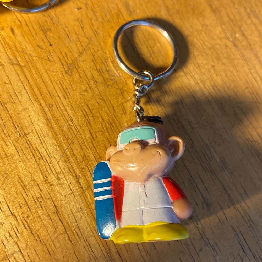 Star Awards Surfing Monky Keychain in good condition